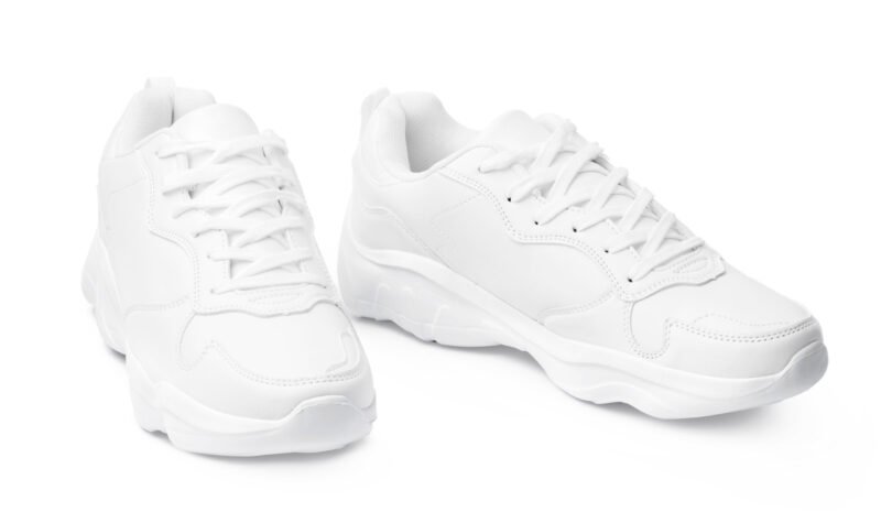 New pair of white sneakers isolated on white background